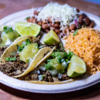 3 Meat Tacos Plate · Choice of meat, served with rice and beans.