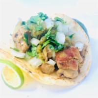 Chicken Taco · grilled chicken, salsa verde cilantro and onions. Served with 1 tortilla.