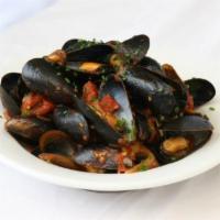 Mussels Polsillippo · Sauteed mussels in marinara sauce.