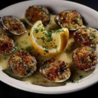 Baked Clams Oreganata · 1/2 doz of whole clams stuffed with seasoned bread crumbs and herbs