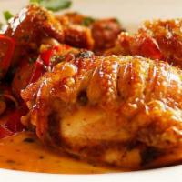 Chicken Scarpariello · Chunks of chicken and sliced sausage sauteed in olive oil, garlic lemon, and white wine in a...