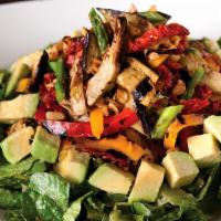 Roasted Veggie Salad · Warm artichoke hearts, asparagus, eggplant, red and yellow peppers, corn and sun-dried tomat...