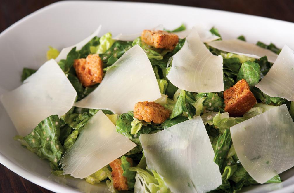Classic Caesar Salad · Crisp romaine with shaved Parmesan and housemade garlic butter croutons.