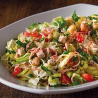 Italian Chopped Salad · Roasted turkey breast, julienned salami, garbanzo beans, tomatoes, mozzarella, and fresh bas...
