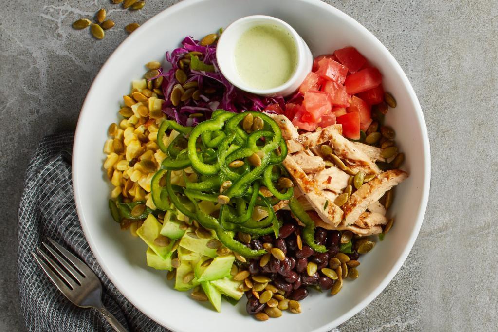 Santa Fe Bowl · Cilantro, farro and spinach topped with lime chicken, tomatoes, sweet corn, black beans, red cabbage, fresh avocado, poblano peppers and toasted pepitas. Served with housemade poblano ranch.