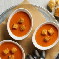 Tomato Basil Bisque · With a touch of cream, topped with housemade garlic butter croutons.