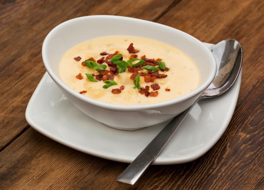 Baked Potato Soup · With Nueske's applewood smoked bacon and scallions.