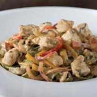 Chicken Tequila Fettuccine · Our creamy jalapeno lime sauce with spinach fettuccine, red onions, bell peppers and cilantro.