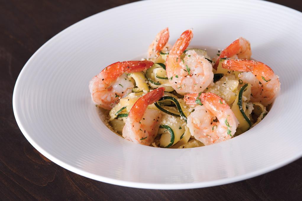 Shrimp Scampi Zucchini  · Our lighter spin on a traditional recipe. Zucchini ribbons sauteed with lemon, garlic and white wine, tossed with parsley, Parmesan and a touch of fettuccine. 