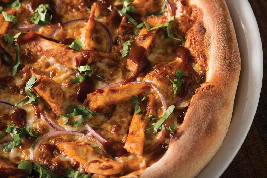The Original BBQ Chicken Pizza · Created in 1985, our legendary BBQ sauce, smoked Gouda, red onions and cilantro transform this original to iconic.