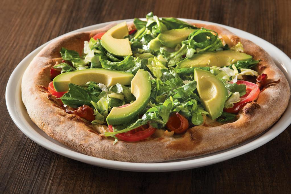 California Club Pizza  · Nueske’s Applewood smoked bacon, grilled chicken and mozzarella, hearth-baked then topped with avocado, wild arugula, fresh tomatoes, torn basil and romaine tossed in lemon-pepper mayo.
