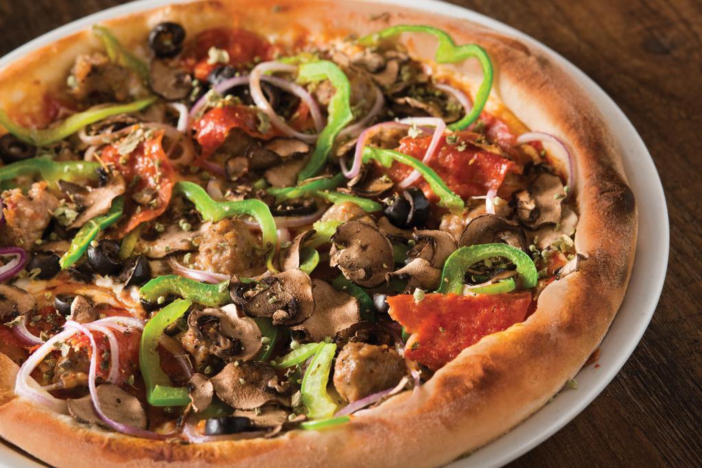 The Works Pizza · Spicy Italian sausage, rustic pepperoni, cremini mushrooms, mozzarella, red onions, green peppers, olives and wild Greek oregano.