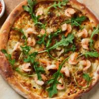 Shrimp Scampi Pizza · Housemade lemon-garlic shrimp with caramelized onions, mozzarella, Parmesan, and red chili, ...