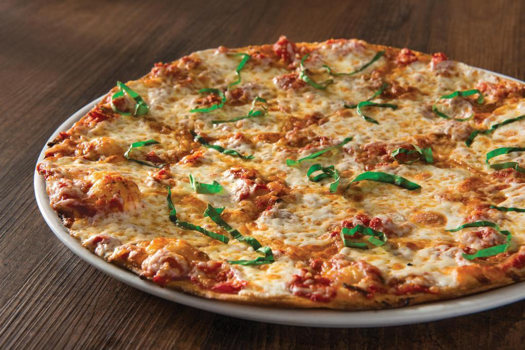 Margherita Pizza · Italian tomatoes with fresh mozzarella, fresh basil and Parmesan. Vegetarian.