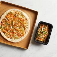 Take and Bake Thai Chicken Pizza · READY TO BAKE - Thai peanut sauce and mozzarella, hearth-baked then topped with crisp bean s...