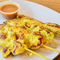 Chicken Satay · Skewer of grilled chicken marinated with herbs and coconut milk, served with peanut sauce.