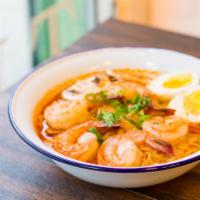 Mama Tom Yum Noodles Soup · Famous Thai ramen noodle hot and sour milk soup with shrimp, chili, tomato, mushroom, scalli...