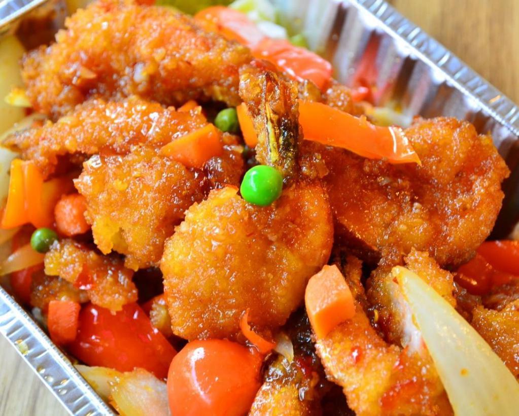 Chili Shrimp · Fried shrimp with onion, red and green pepper, green pea and carrot in chili sauce. Without rice.