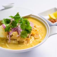 Ohnoh Kawt Swe Soup · Coconut noodle soup. A rich and creamy coconut bisque with egg noodles. Served with chicken,...
