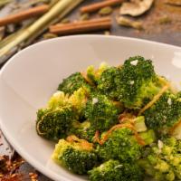 Broccoli and Garlic · Broccoli tossed in wok with white wine, garlic, ginger and garnished with fried onions.