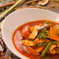 Mixed Vegetable Curry · Tomatoes, okra, eggplant, yellow beans, carrots, potatoes, cabbage, lentils and tofu come to...