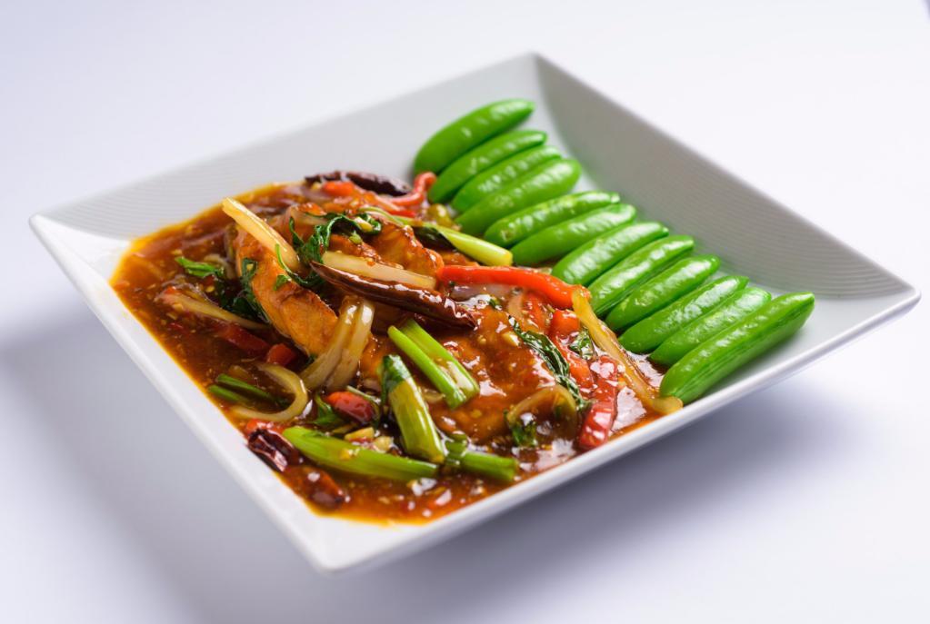 Salmon Lemongrass Fusion · Quick fried salmon served with sauteed veggies in a lemongrass sauce. Spicy.