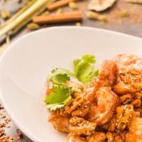 Walnut Shrimp · Lightly fried shrimp wok tossed with a creamy sweet sauce; topped with candied walnuts and s...