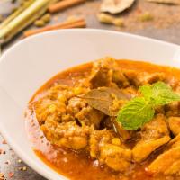 Rangoon Chicken Curry · Chicken thigh cooked with yellow beans in a light curry. Spicy.