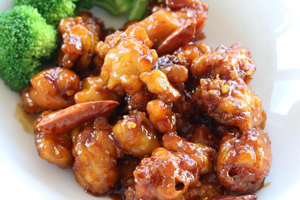 Chicken Crisp · Deep fried crispy chicken tossed in wok with garlic, ginger and sweet chili sauce. Spicy.