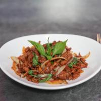 Basil Chili Lamb · Strips of lamb tossed with dried chili flakes, spices, jalapenos and onions; finished with b...