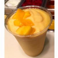 Mango Bliss Smoothie · Non-fat yogurt, mango, pineapple, passion fruit, honey and bee pollen energizer.