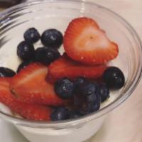 Organic Chia Cup · Organic chia and almond milk, coconut whipped cream topped with blueberry, banana, strawberr...