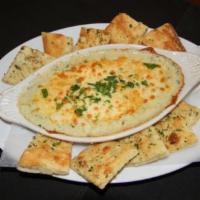 Spinach and Artichoke Dip · A blend of fresh spinach, kale, artichoke hearts and roasted garlic, swirled in creamy Alfre...