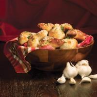 Homemade Garlic Knots · Hand-knotted pizza dough tossed with Sicilian extra-virgin olive oil, fresh garlic and Pecor...