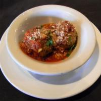 Russo's Famous Homemade Meatballs · Two large homemade Italian meatballs served with Russo’s Chianti-braised meat sauce