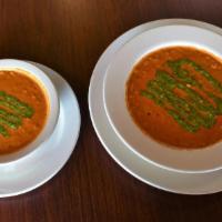 Tomato Basil Soup · Roasted Roma tomatoes and the freshest basil in a creamy tomato bisque.