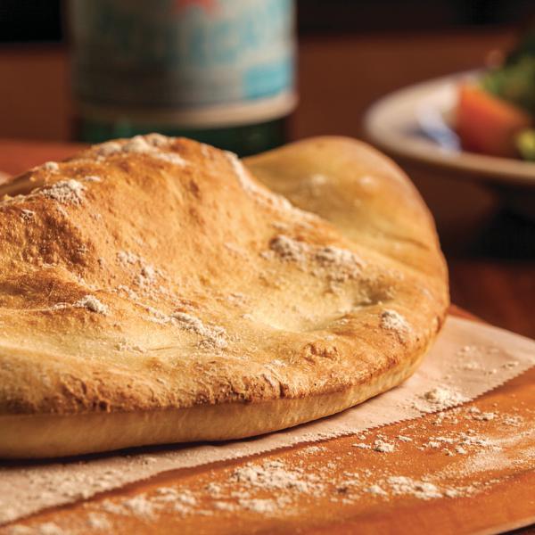 Create-Your-Own Calzone · Choose up to 3 toppings. We'll add Wisconsin mozzarella. Served with our homemade marinara sauce.