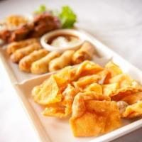 Appetizer Plate · An abundant platter of fried fishcakes, fried wontons, and miniature fried spring rolls. Ser...