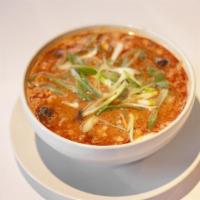 Tom Yum Moo Sub Nam Kon Soup · This dish is very similar to traditional tom yum, but with coconut milk and ground pork for ...