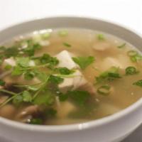 Tofu Soup · A light, flavorful soup made with a clear broth, tofu, seasoned ground pork, mushrooms, whit...