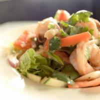 Prawn Salad · Succulent prawns steamed and tossed with cucumber, tomatoes, red onion, lettuce, green onion...