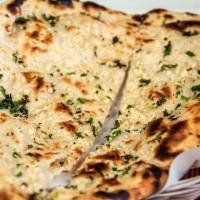 GARLIC NAAN · Naan stuffed with garlic and spices.