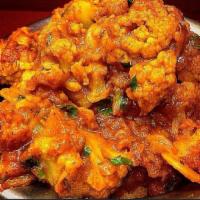 Aloo Gobi · Cauliflower and potatoes cooked with herbs and spices.