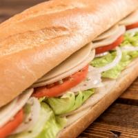 Vegetarian Turkey Sub · Gobble up this vegetarian favorite made with sliced vegetarian turkey, provolone cheese, let...
