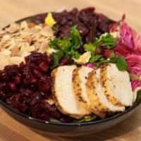 Sienna Salad · All natural grilled chicken, radicchio, Kalamata olives, Italian parsley, toasted almonds, d...