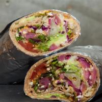 Ensalada Mexicana Wrap · Avocado, leardrop tomatoes, in-house pickled red onions, grilled corn, crispy jalapenos, pep...