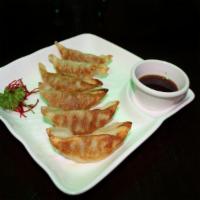 Gyoza · Pan fried chicken dumpling. 6 pieces.