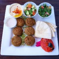 Falafel Plate · With your choice of 3 sides. Ground, spiced chickpeas deep fried to a golden crisp on the ou...