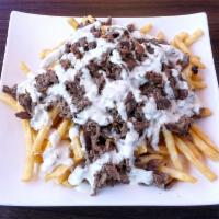 Sahara Fries · Your choice of protein loaded on top of french fries. Served with ranch and choice of tahini...