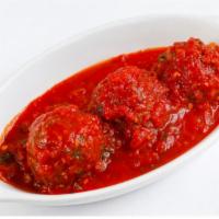 Polpette alla Campagnola · Ground beef, veal and pork meatballs, tomato sauce and Parmigiana reggiano.